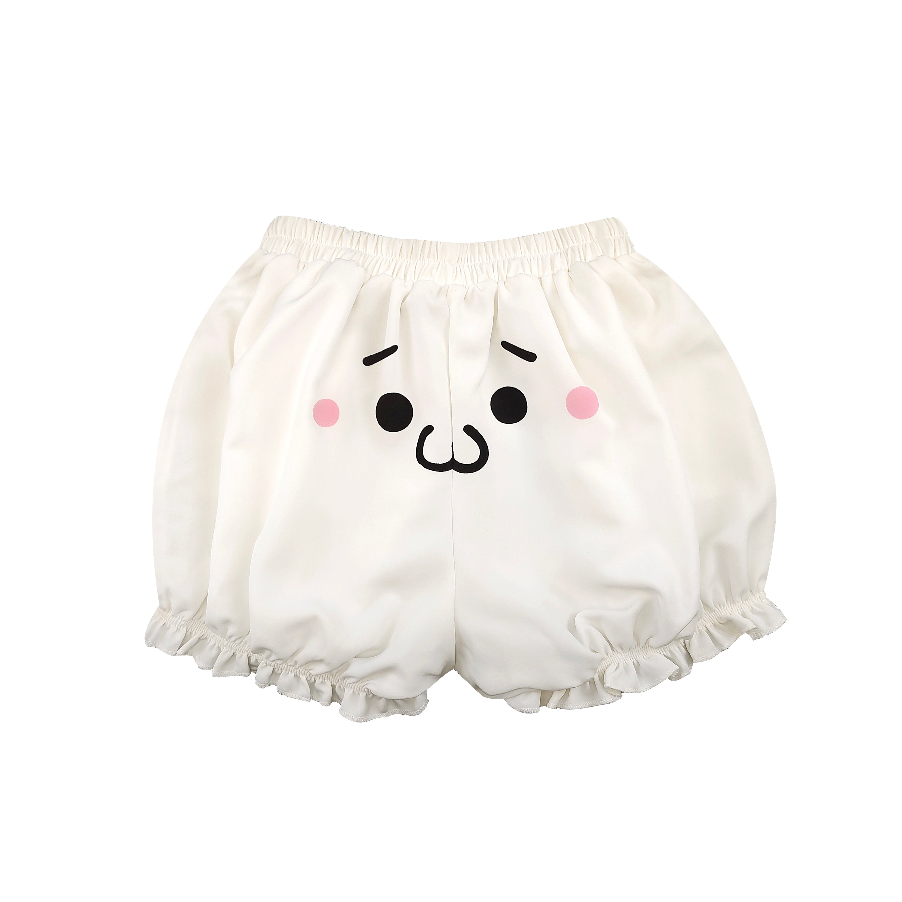White ruffled bloomer-style shorts with cute cartoon face print and elastic waist, soft cotton fabric.