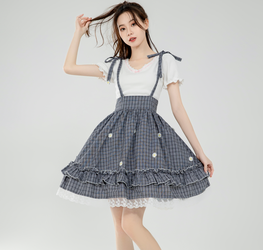 Gray plaid suspender skirt with cute daisy accents and frilly details