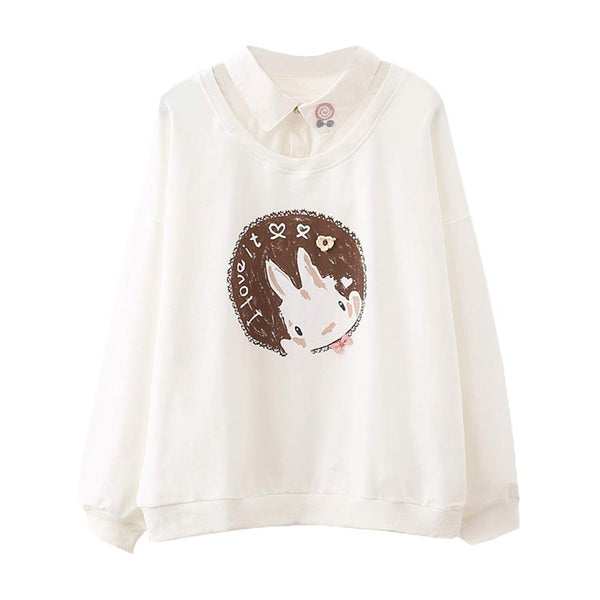 Cream sweatshirt with bunny print and white Peter Pan collar in layered style