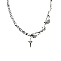 A futuristic silver-toned necklace with irregular molten-style chain links and a minimalist pointed star drop pendant – elegant with a modern edge.
