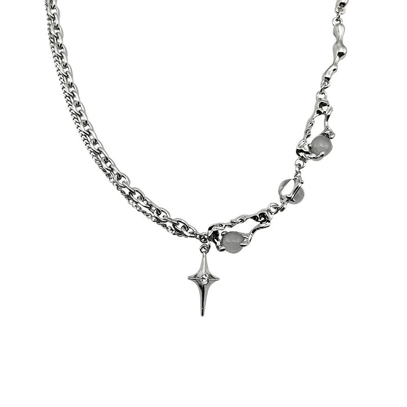A futuristic silver-toned necklace with irregular molten-style chain links and a minimalist pointed star drop pendant – elegant with a modern edge.