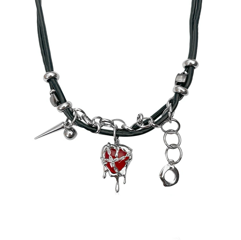 A futuristic silver-toned necklace with irregular molten-style chain links and a minimalist pointed star drop pendant – elegant with a modern edge.