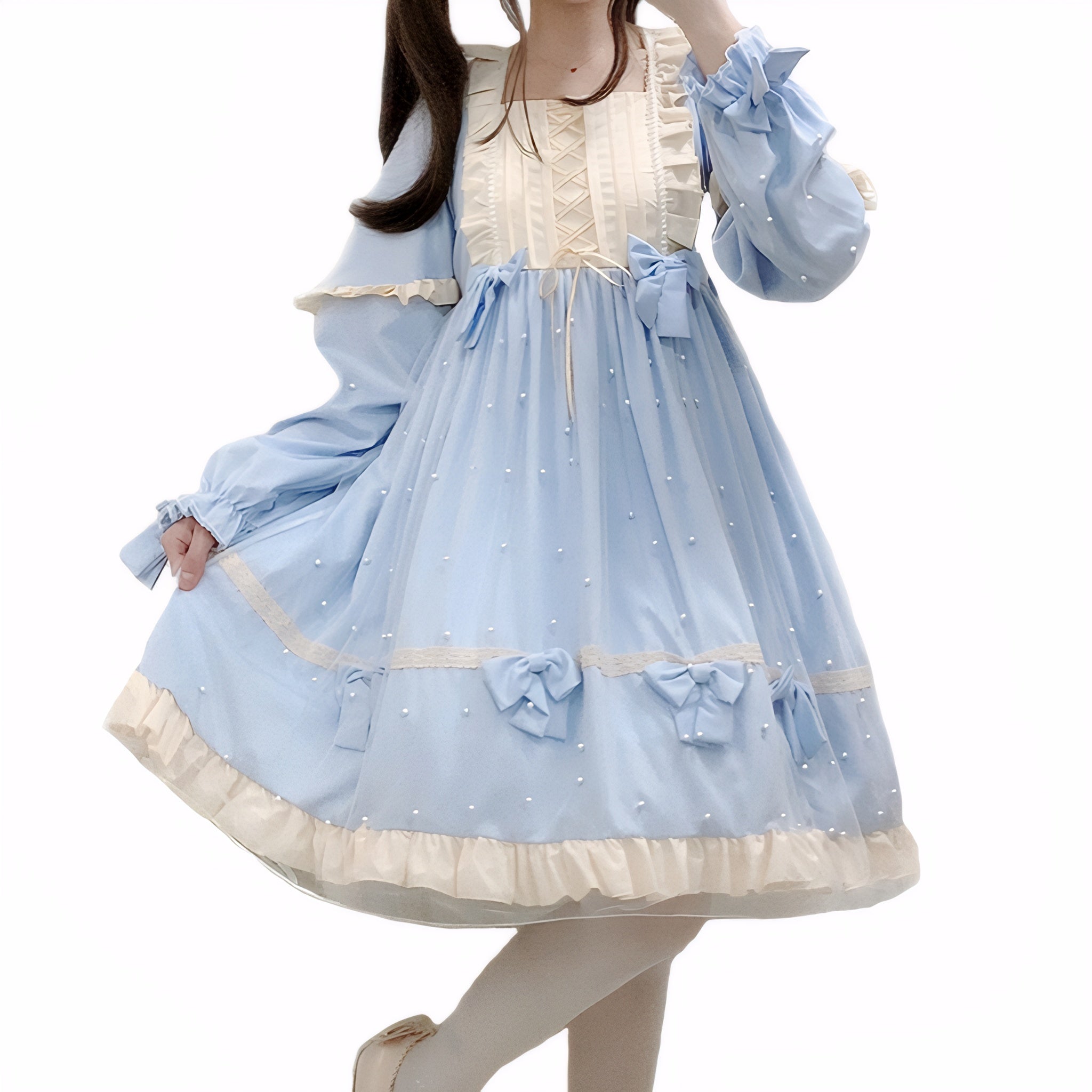 Model wearing pastel pink/blue Lolita long sleeve dress with mesh pearl overlay and bows