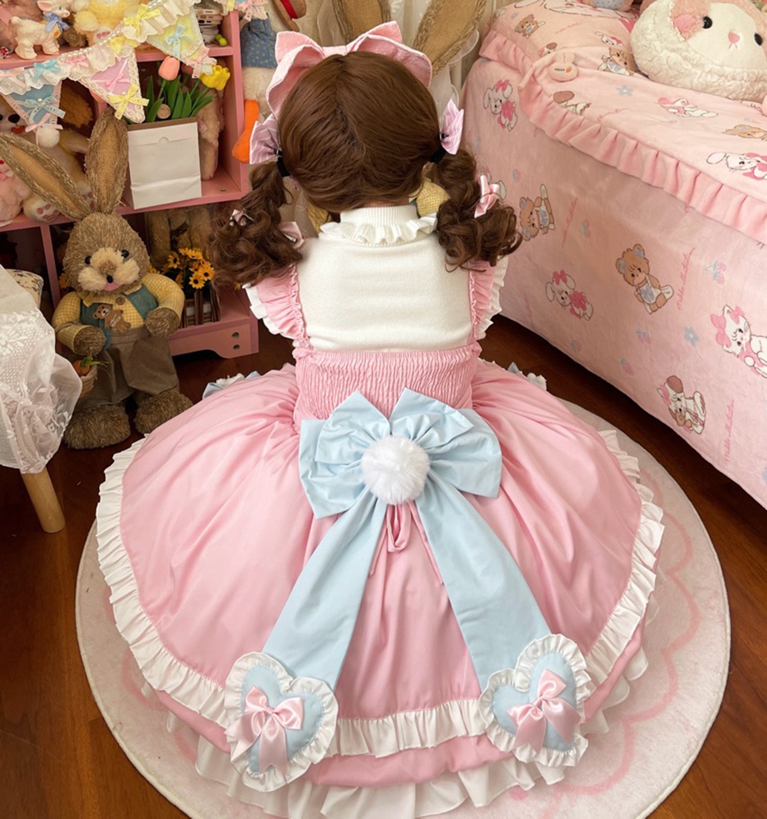 Kawaii Lolita dress with apron design and cat plush bows in pastel pink and blue