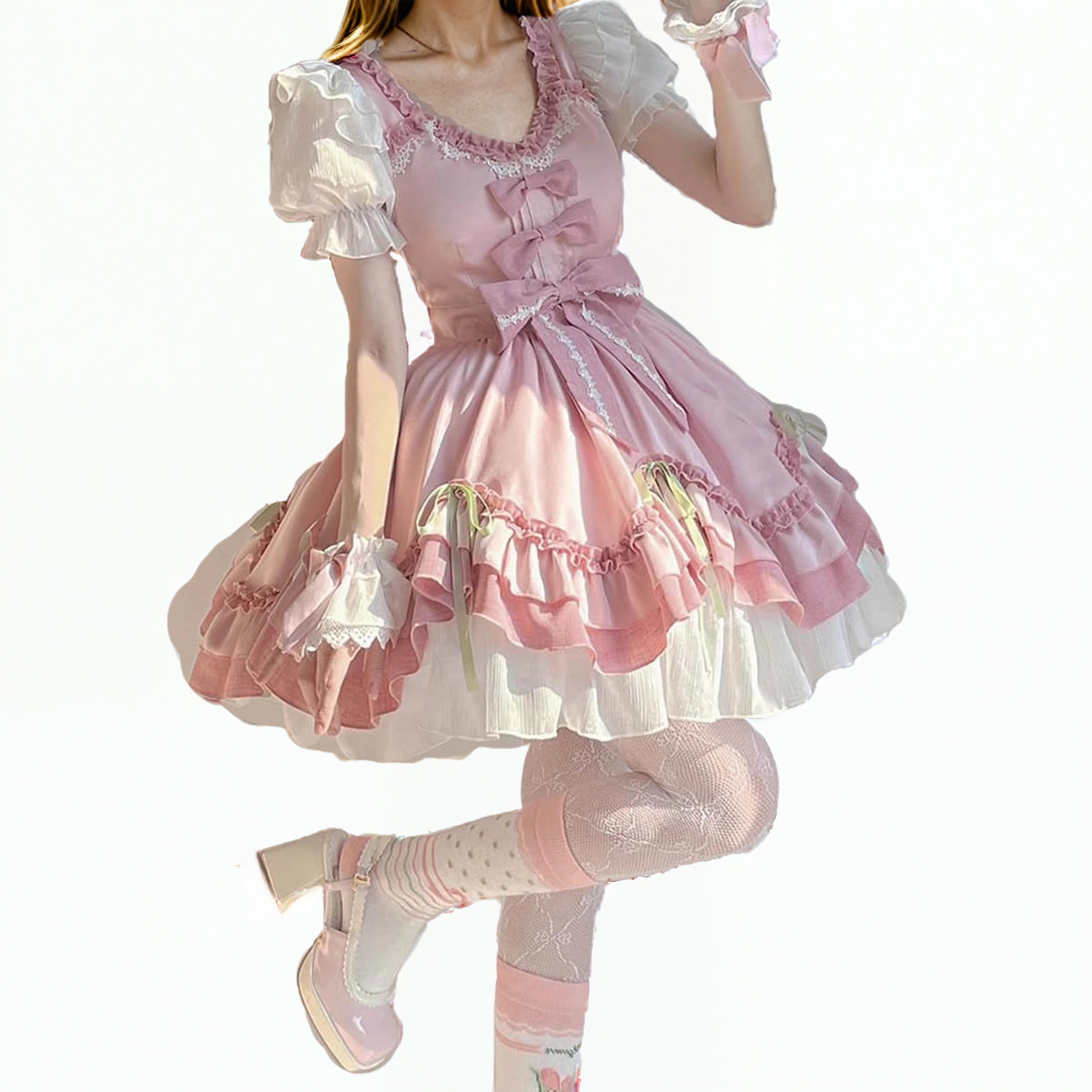 Model wearing a pink sweet Lolita dress with layered ruffle skirt, puff sleeves, lace trim, and large bows in kawaii princess style