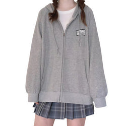 Front view of vintage patch light gray zip-up hoodie with raglan sleeves