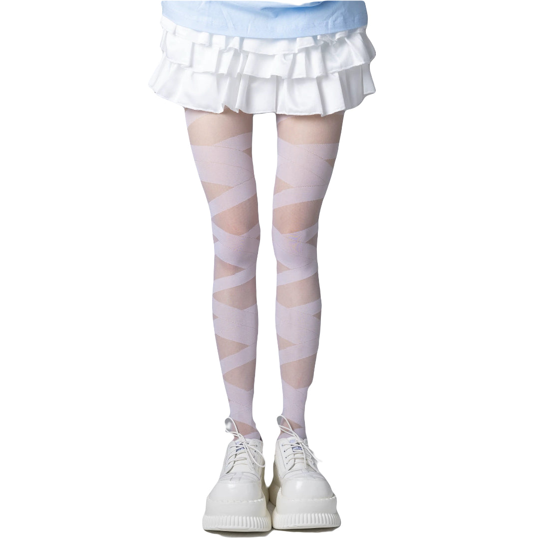 White gothic wrap-style thigh highs with mini skirt and chunky shoes