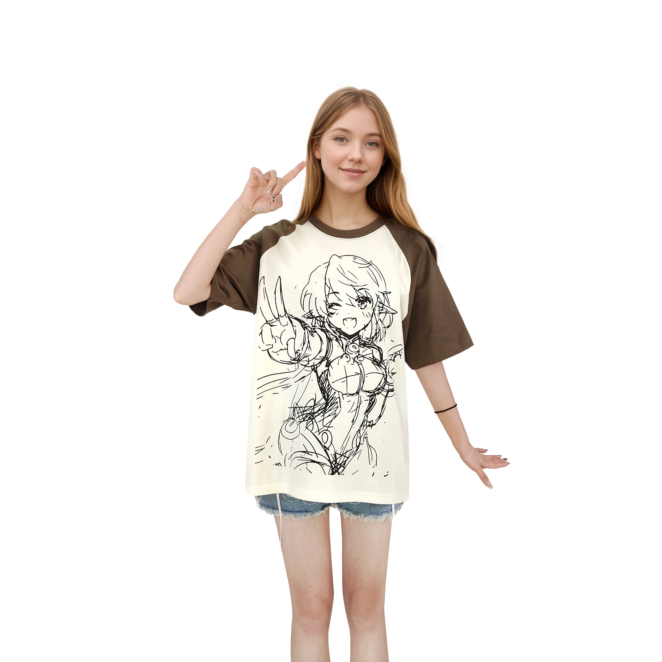 Smiling model in oversized cream T-shirt with brown raglan sleeves and anime sketch print making a peace sign