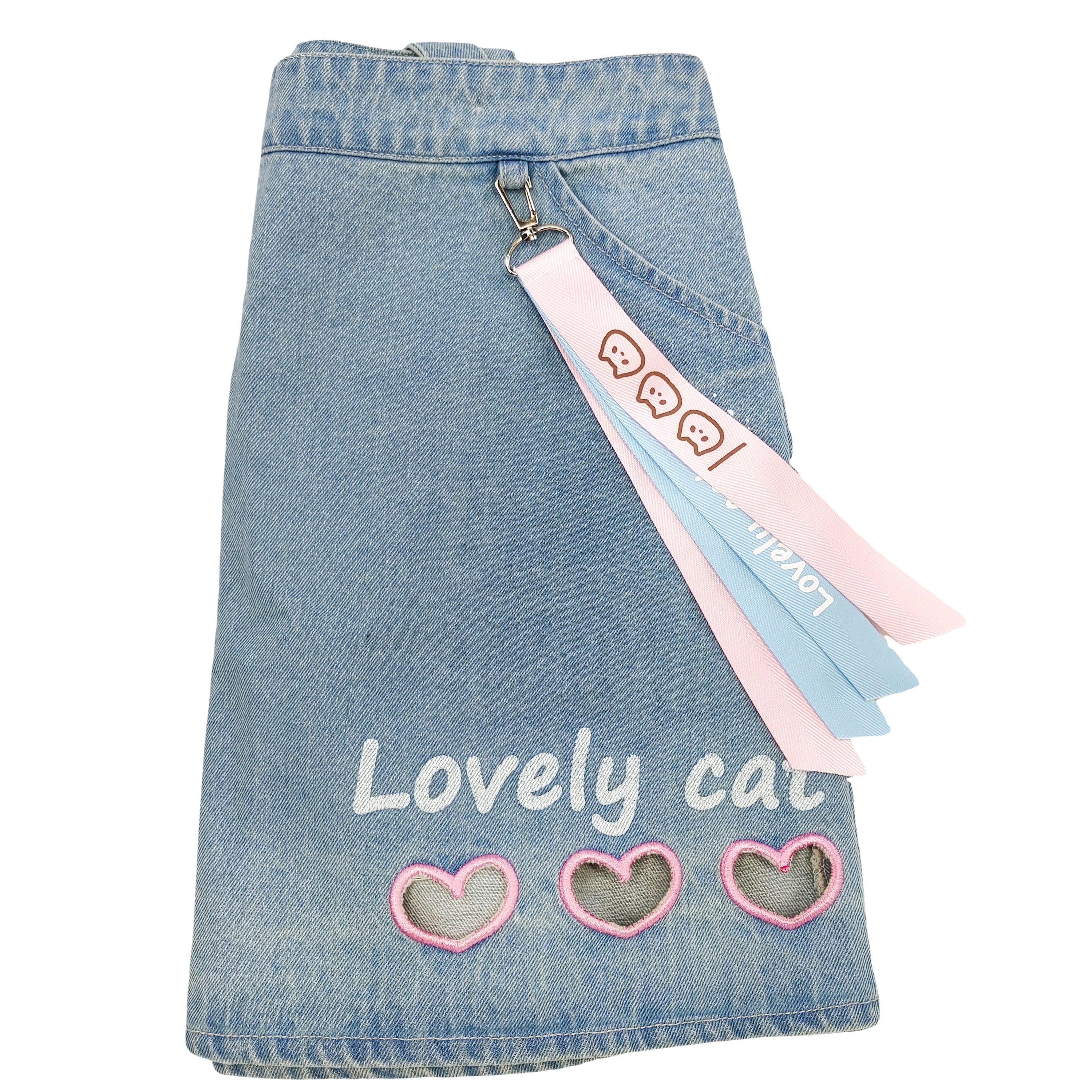 Denim mini skirt with removable suspenders, pastel pink buttons, and kawaii keychain charm.