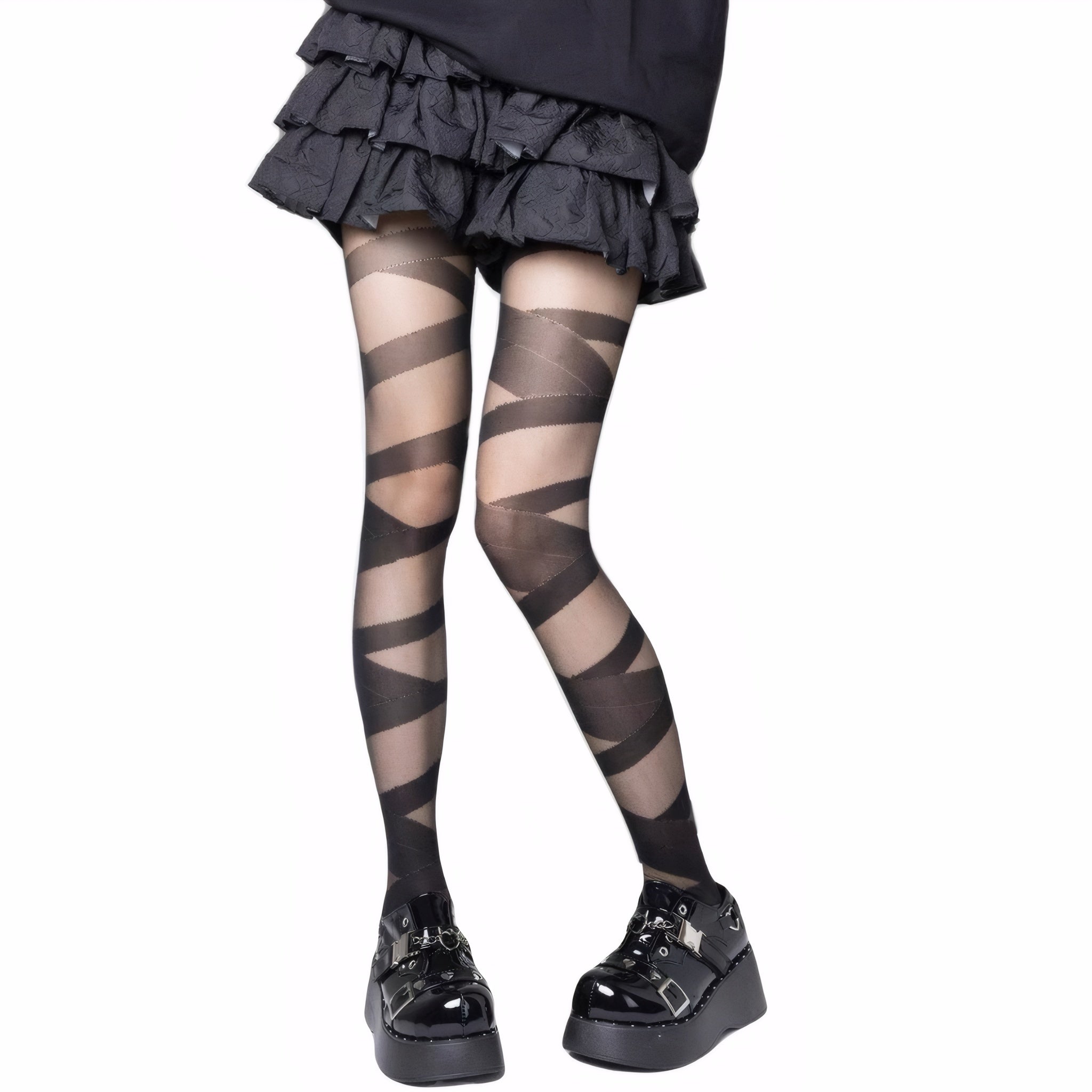 Black gothic bandage-style tights with punk skirt and platform shoes