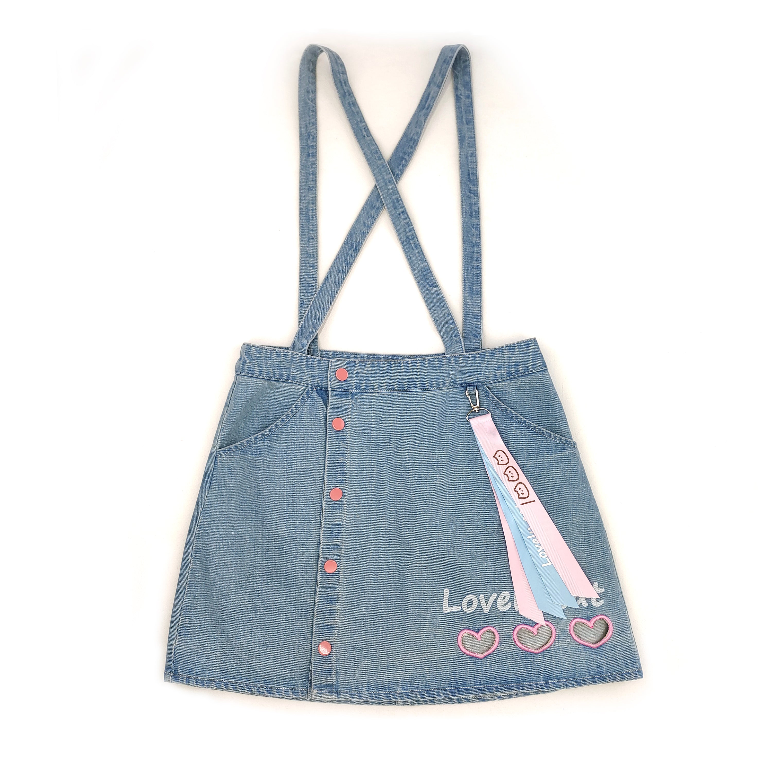 Front view of blue denim suspender skirt with pink heart embroidery and “Lovely Cat” print.