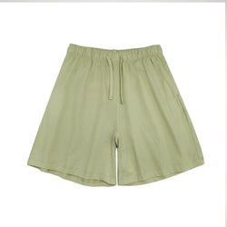 Light green cotton-linen shorts for women, loose fit with elastic waistband and side pockets