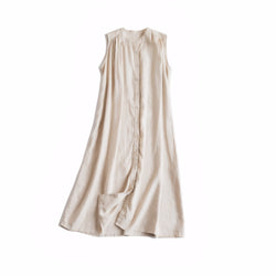 Cream white linen long sleeveless shirt dress laid flat