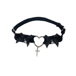 Black lace Lolita thigh garter with heart charm, cross pendant, and satin bows.