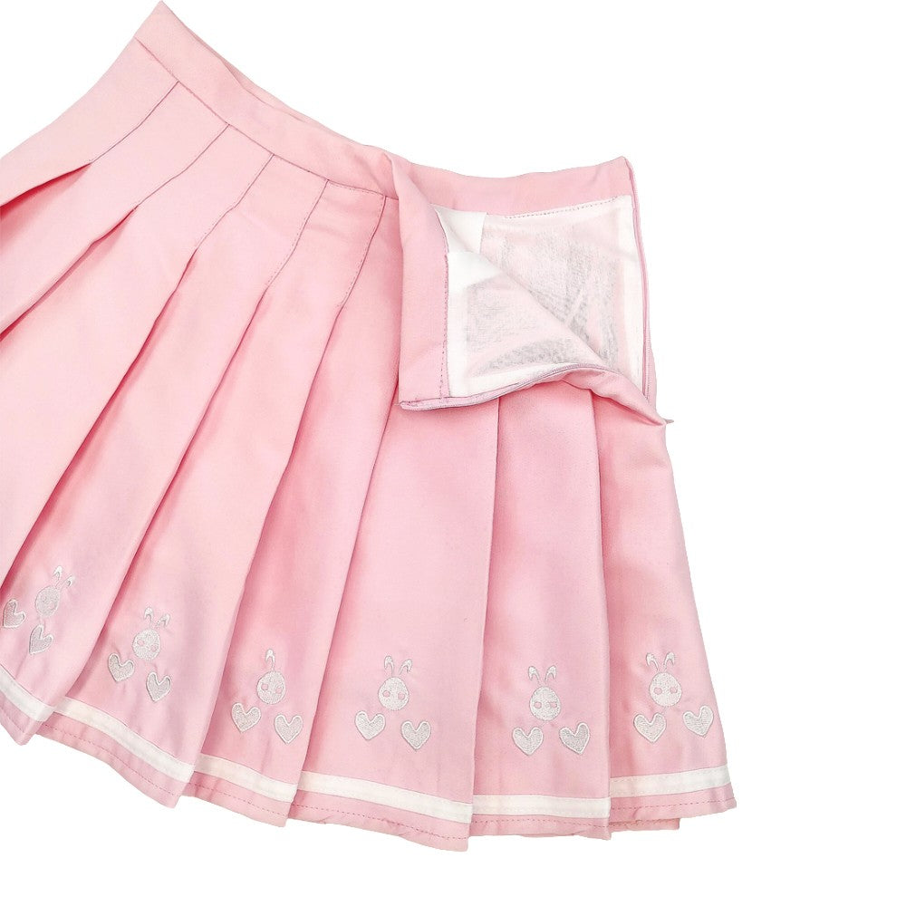 Embroidered bunny faces and hearts design on pastel pink pleated fabric