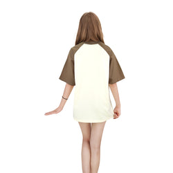 Back view of cream and brown raglan graphic tee showing solid panel and relaxed fit