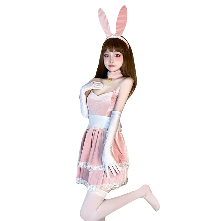 Bunny girl posing in velvet cosplay dress, complete with choker and satin gloves.