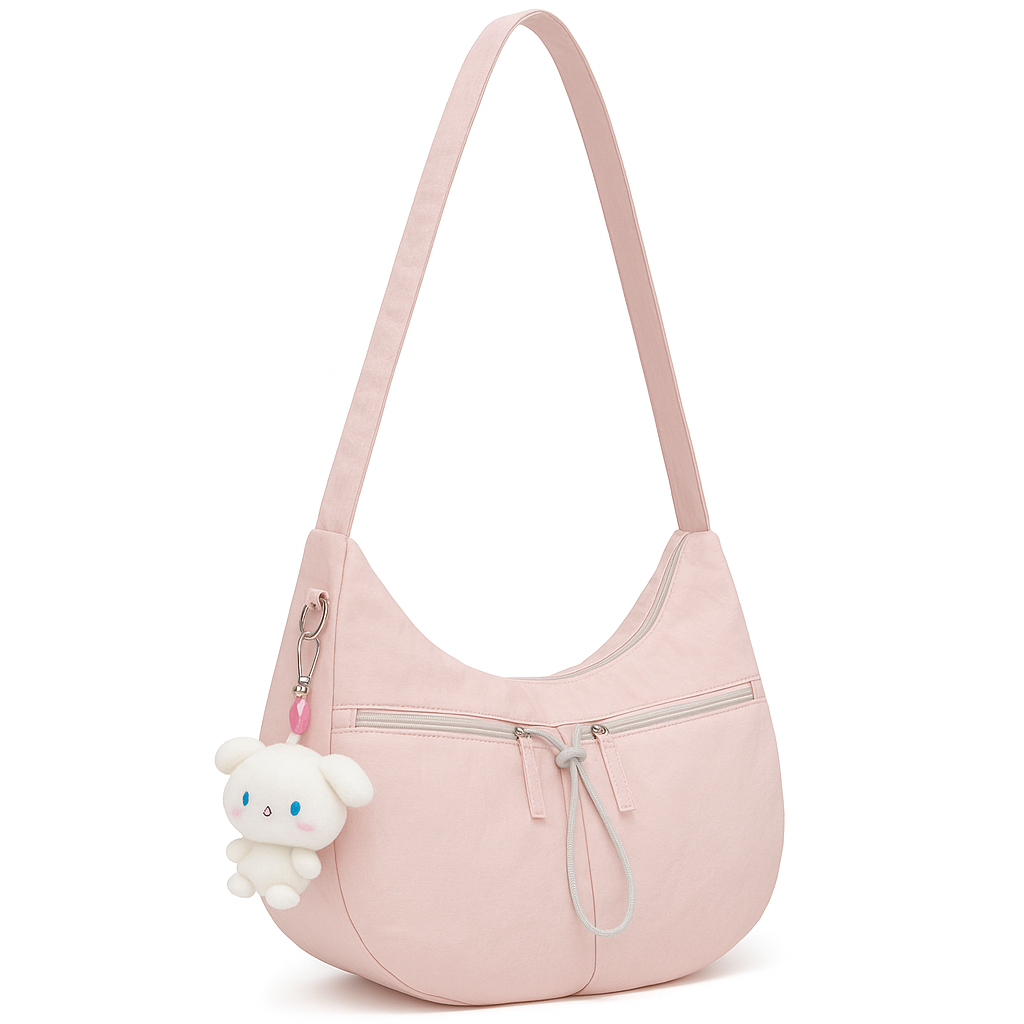 Light pink nylon shoulder bag with zippered pockets and a plush bunny keychain, styled for young women’s casual or daily use