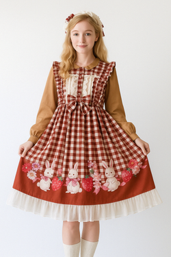 A cute red Lolita dress with bunny and strawberry print, puffed long sleeves, and lace trim