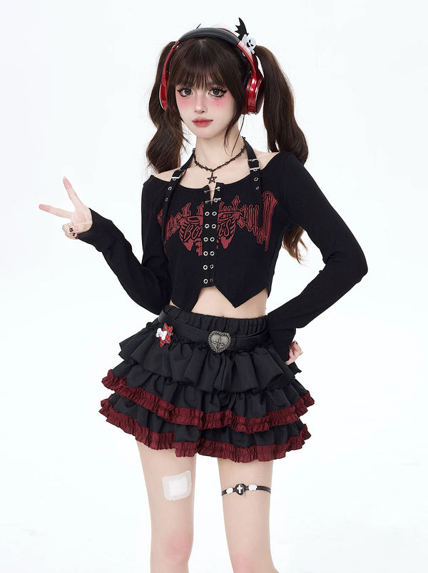 Model wearing dark punk cake skirt with triple ruffles and contrast hem