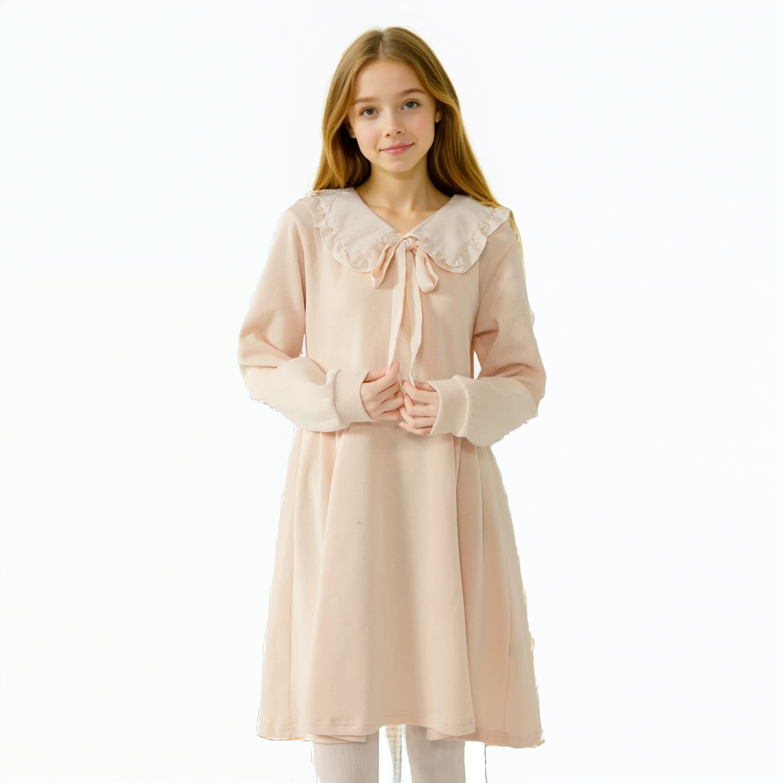 Girl wearing a cream long sleeve A-line dress with ruffled Peter Pan collar and bow tie, kawaii style