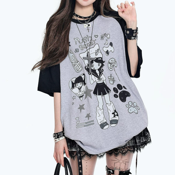 Girl wearing black and grey Push Beeb Yami Kawaii oversized T-shirt with manga print